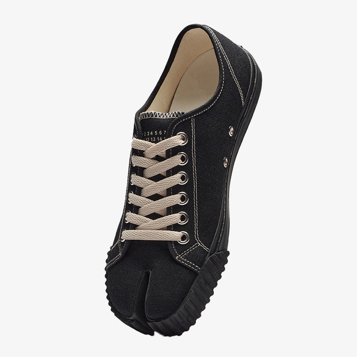 Statement-making Black Canvas Sneakers - Arno Conti Shoe